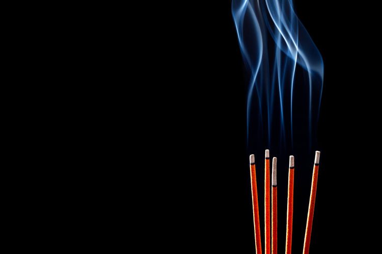 burning incense sticks 